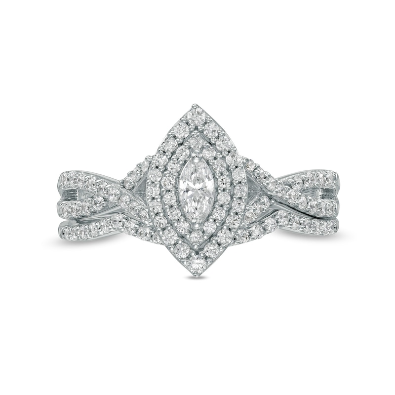 0.58 CT. T.W. Marquise Diamond Double Frame Twist Shank Bridal Set in 10K White Gold (I/I2)