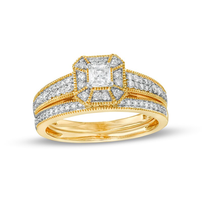 0.45 CT. T.W. Princess-Cut Diamond Frame Three Piece Bridal Set in 10K Gold (J/I3)