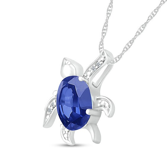 Oval Blue Lab-Created Sapphire and Diamond Accent Beaded Tilted Sea Turtle Pendant in Sterling Silver