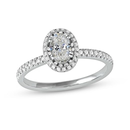 0.75 CT. T.W. Oval Diamond Frame Engagement Ring in Platinum (I/SI2)