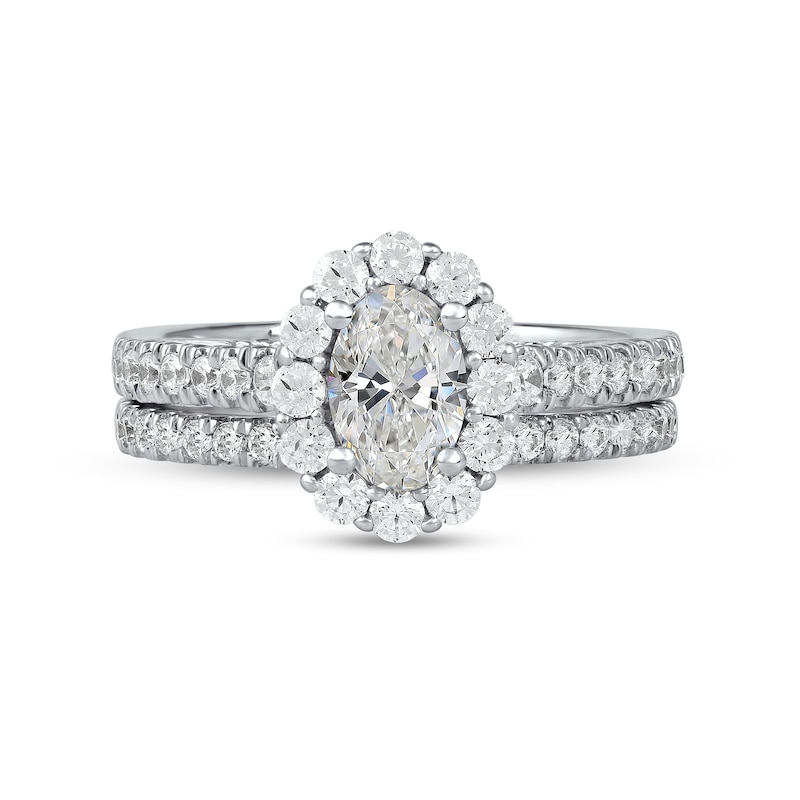 1.75 CT. T.W. Oval Diamond Scallop Frame Bridal Set in Platinum (I/SI2)