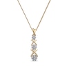 Thumbnail Image 1 of 0.10 CT. T.W. Multi-Diamond Graduated Three Stone "XO" Drop Pendant in Sterling Silver with 14K Gold Plate