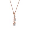 Thumbnail Image 2 of 0.10 CT. T.W. Multi-Diamond Graduated Three Stone "XO" Drop Pendant in Sterling Silver with 14K Rose Gold Plate