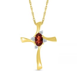 Oval Garnet and Diamond Accent Swirl Ribbon Cross Pendant in 10K Gold