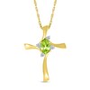 Oval Peridot and Diamond Accent Swirl Ribbon Cross Pendant in 10K Gold