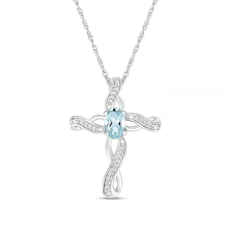 Oval Aquamarine and 0.04 CT. T.W. Diamond Infinity Ribbon Cross Pendant in 10K White Gold|Peoples Jewellers