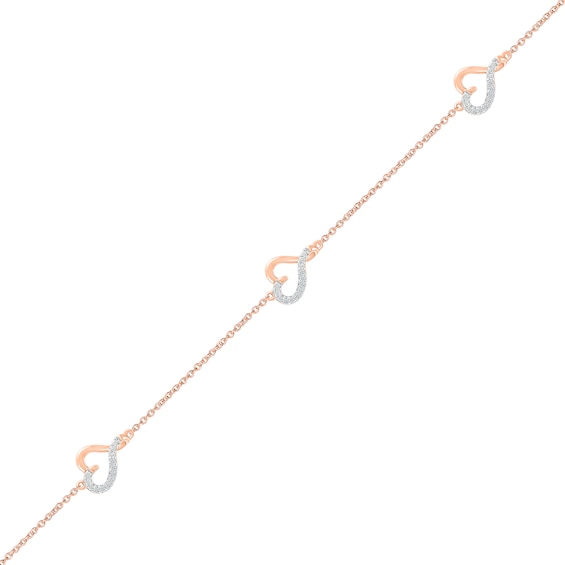 0.065 CT. T.W. Diamond Hearts Station Bracelet in Sterling Silver with 14K Rose Gold Plate - 7.5"