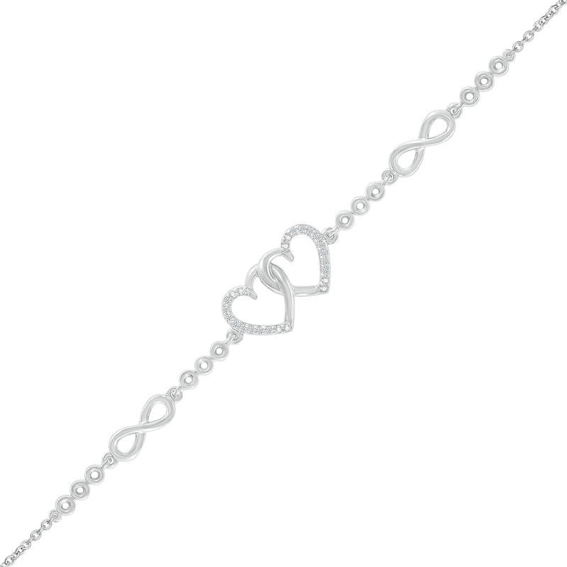 0.04 CT. T.W. Diamond Interlocking Hearts and Infinity Symbol Station Bracelet in Sterling Silver - 7.5"|Peoples Jewellers