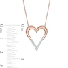 0.04 CT. T.W. Diamond Elongated Heart Pendant in 10K Rose Gold