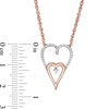 0.145 CT. T.W. Diamond Double Elongated Heart Necklace in Sterling Silver with 14K Rose Gold Plate