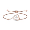 Thumbnail Image 1 of 0.088 CT. T.W. Diamond Interlocking Double Elongated Heart Bolo Bracelet in Sterling Silver with 14K Rose Gold Plate