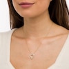 Thumbnail Image 2 of 0.18 CT. T.W. Diamond Elongated Heart Sunburst Pendant in 10K Gold