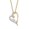 0.23 CT. T.W. Baguette and Round Diamond Tilted Scatter Heart Pendant in 10K Gold