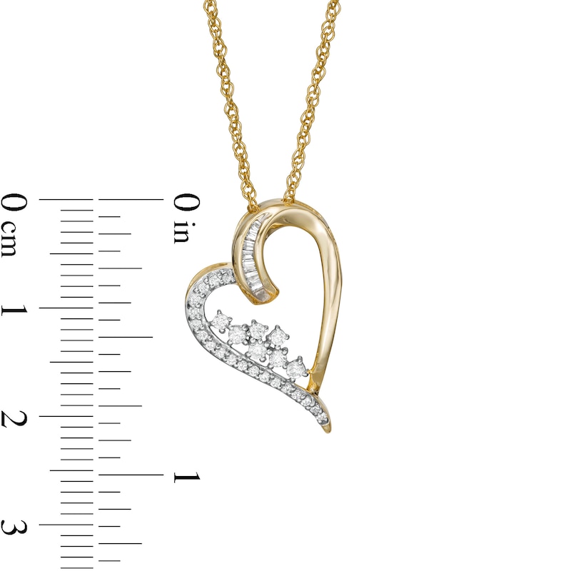 0.23 CT. T.W. Baguette and Round Diamond Tilted Scatter Heart Pendant in 10K Gold