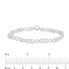 Thumbnail Image 4 of Oval White Lab-Created Sapphire and 0.18 CT. T.W. Diamond Infinity Ribbon Link Line Bracelet in Sterling Silver – 7.5"
