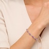 Thumbnail Image 2 of Oval Pink Lab-Created Sapphire and 0.18 CT. T.W. Diamond Infinity Ribbon Link Line Bracelet in Sterling Silver – 7.5"