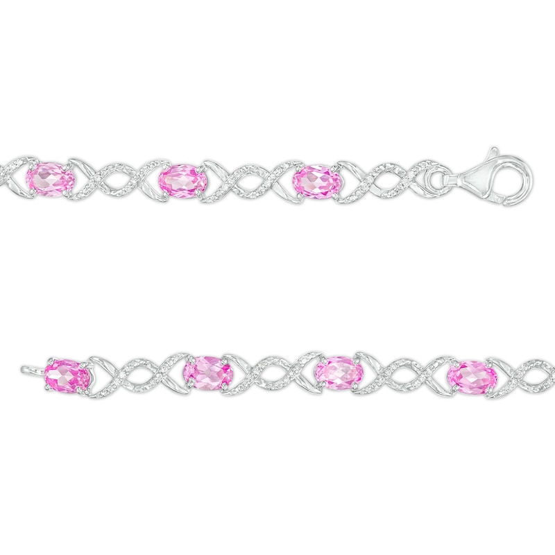 Main Image 3 of Oval Pink Lab-Created Sapphire and 0.18 CT. T.W. Diamond Infinity Ribbon Link Line Bracelet in Sterling Silver – 7.5"