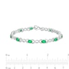 Thumbnail Image 4 of Oval Lab-Created Emerald and 0.18 CT. T.W. Diamond Infinity Ribbon Link Line Bracelet in Sterling Silver – 7.5"