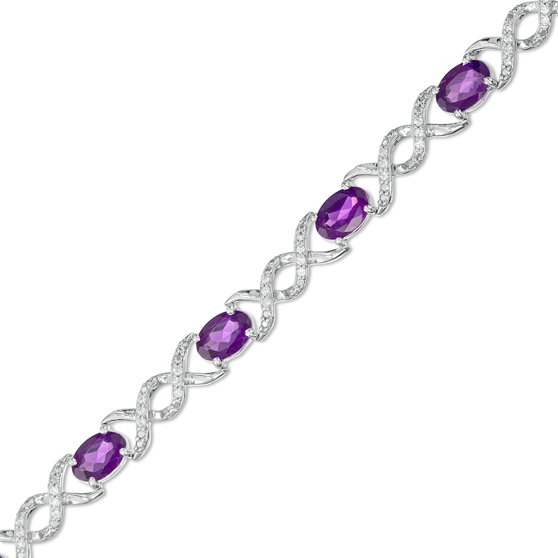 Oval Amethyst and 0.18 CT. T.W. Diamond Infinity Ribbon Link Line Bracelet in Sterling Silver – 7.5"|Peoples Jewellers