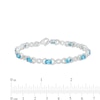 Thumbnail Image 4 of Oval Blue Topaz and 0.18 CT. T.W. Diamond Infinity Ribbon Link Line Bracelet in Sterling Silver – 7.5"