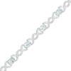 Thumbnail Image 1 of Oval Aquamarine and 0.18 CT. T.W. Diamond Infinity Ribbon Link Line Bracelet in Sterling Silver – 7.5"