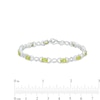 Thumbnail Image 4 of Oval Peridot and 0.18 CT. T.W. Diamond Infinity Ribbon Link Line Bracelet in Sterling Silver – 7.5"