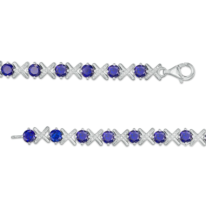 Main Image 3 of 4.5mm Blue Lab-Created Sapphire and 0.14 CT. T.W. Diamond Alternating "XO" Line Bracelet in Sterling Silver – 7.5"