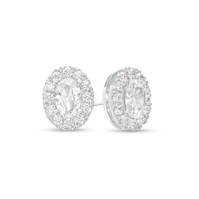 0.75 CT. T.W. Certified Canadian Oval Diamond Frame Stud Earrings in 14K White Gold (I/I2)
