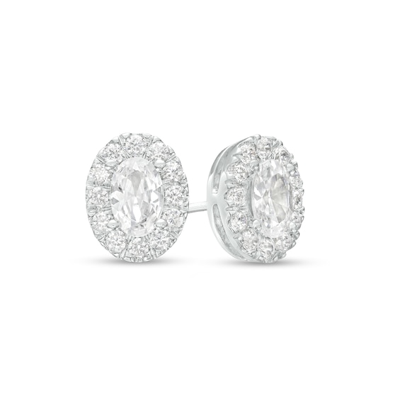 0.75 CT. T.W. Certified Canadian Oval Diamond Frame Stud Earrings in 14K White Gold (I/I2)
