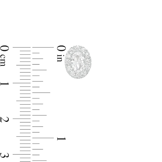 0.75 CT. T.W. Certified Canadian Oval Diamond Frame Stud Earrings in 14K White Gold (I/I2)