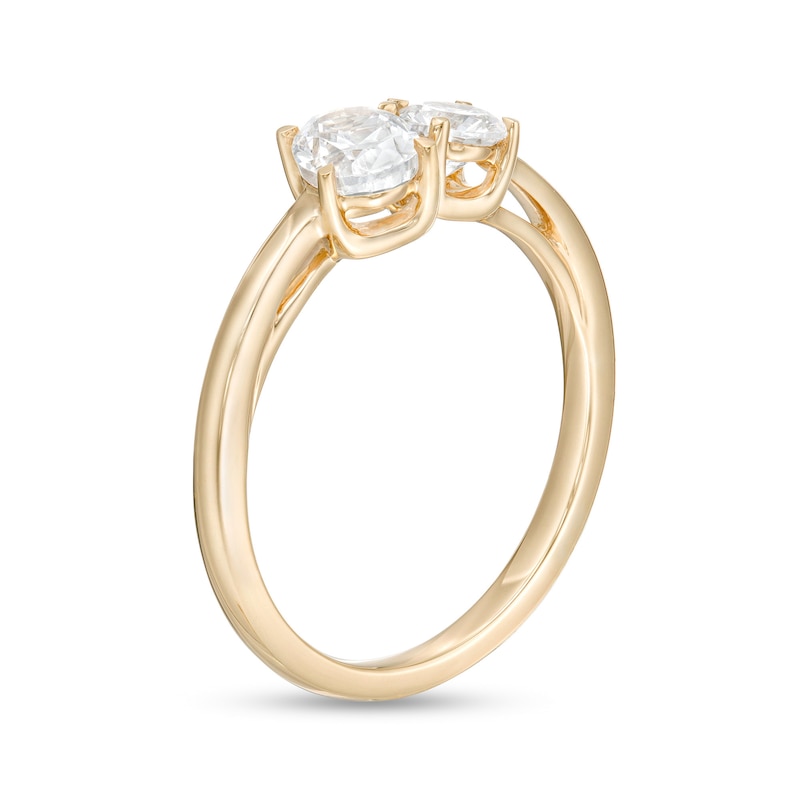 0.75 CT. T.W. Oval and Round Diamond Duo Engagement Ring in 14K Gold