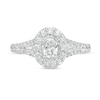 1.00 CT. T.W. Oval Diamond Frame Split Shank Engagement Ring in 14K White Gold (I/I2)