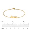 Thumbnail Image 2 of White Lab-Created Sapphire Cursive "love" Bracelet in Sterling Silver with 14K Gold Plate – 6.5"