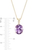 Oval Amethyst and Diamond Accent Twist Bail Pendant in 10K Gold
