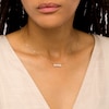 Thumbnail Image 1 of 3.5-4.0mm Button Cultured Freshwater Pearl and White Lab-Created Sapphire "MOM" Necklace in 10K Gold