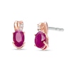 Thumbnail Image 0 of Certified Oval Ruby and Diamond Accent Stud Earrings in 10K Two-Tone Gold