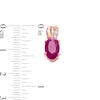 Thumbnail Image 2 of Certified Oval Ruby and Diamond Accent Stud Earrings in 10K Two-Tone Gold