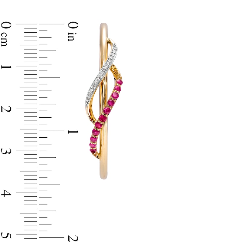 Lab-Created Ruby and 0.085 CT. T.W. Diamond Swirl Crossover Hoop Earrings in 10K Gold