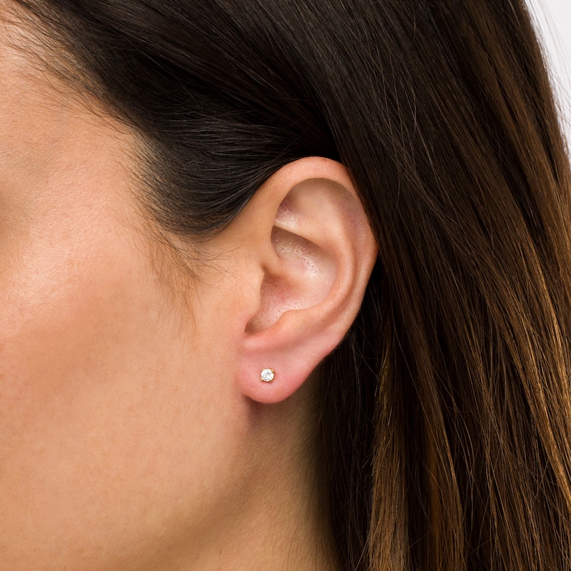 Main Image 2 of 0.20 CT. T.W. Diamond Solitaire Stud Earrings in 10K Gold (J/I3)