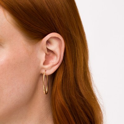 Italian Gold 22.5mm Diamond-Cut Twist Flat Tube Oval Hoop Earrings in 18K Gold