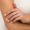 0.30 CT. T.W. Oval and Round Diamond Twist Wedding Band in 14K White Gold