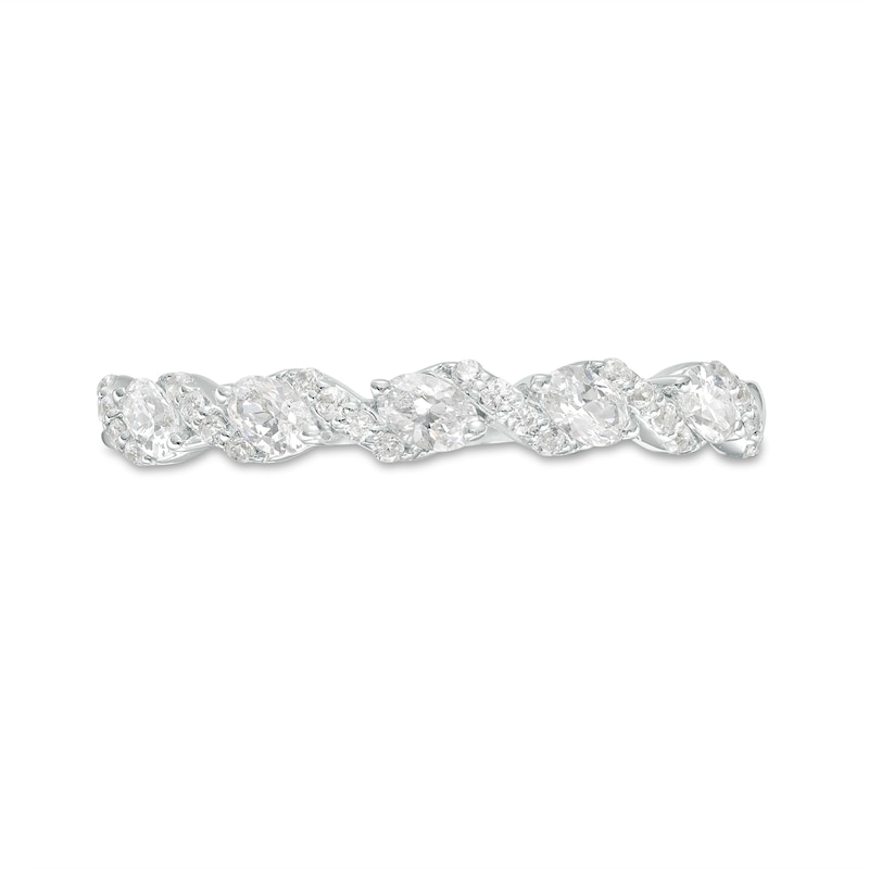 0.30 CT. T.W. Oval and Round Diamond Twist Wedding Band in 14K White Gold