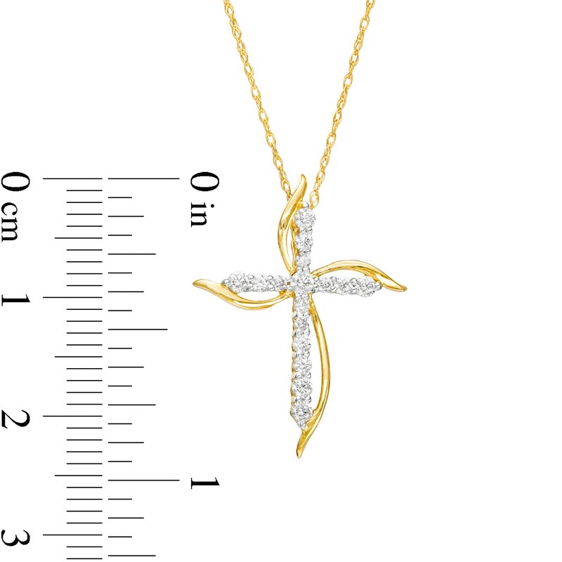 0.23 CT. T.W. Diamond Pinwheel Cross Pendant in 10K Gold