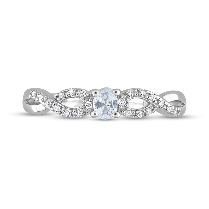 Oval White Lab-Created Sapphire and 0.08 CT. T.W. Diamond Twist Split Shank Promise Ring in Sterling Silver
