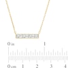 0.15 CT. T.W. Baguette and Round Diamond Bar Necklace in 10K Gold