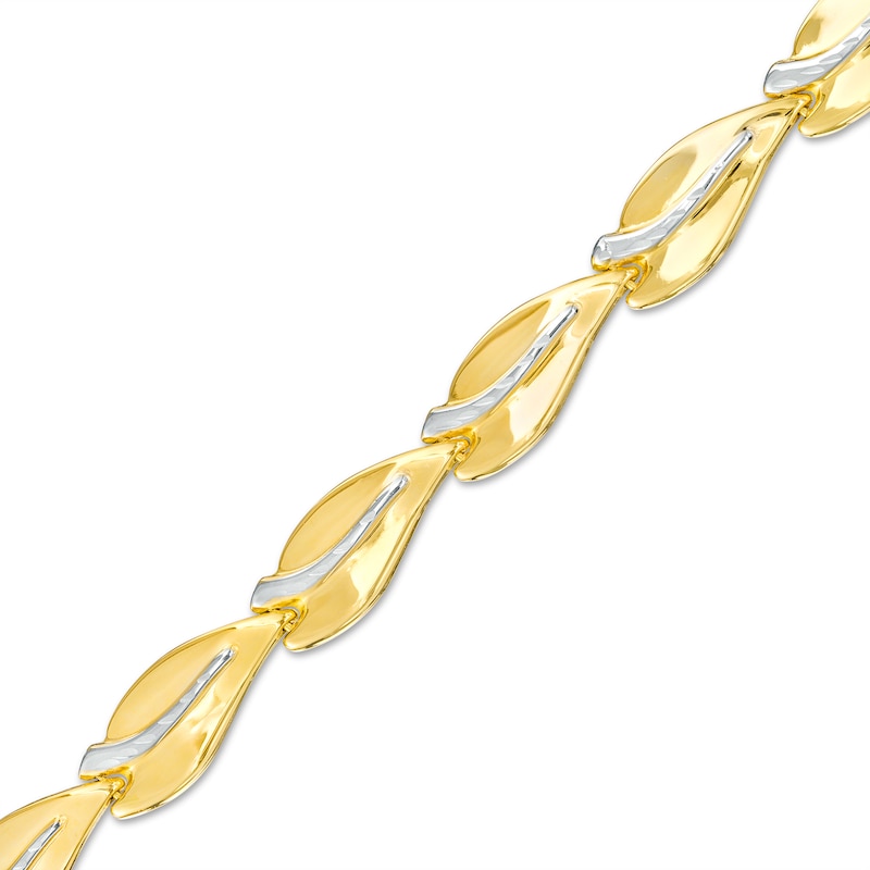 Diamond-Cut Curve Link Bracelet in 10K Two-Tone Gold – 7.25"|Peoples Jewellers