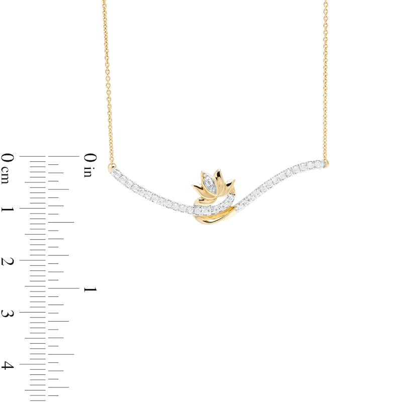 By Women for Women 0.20 CT. T.W. Diamond Swirl Bypass Bar with Lotus Flower Necklace in 10K Gold