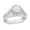 Thumbnail Image 1 of 6.5mm White Lab-Created Sapphire and 0.06 CT. T.W. Diamond Flower Frame Bridal Set in 10K White Gold