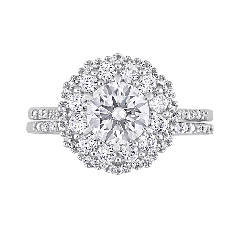 6.5mm White Lab-Created Sapphire and 0.10 CT. T.W. Diamond Flower Frame Bridal Set in 10K White Gold