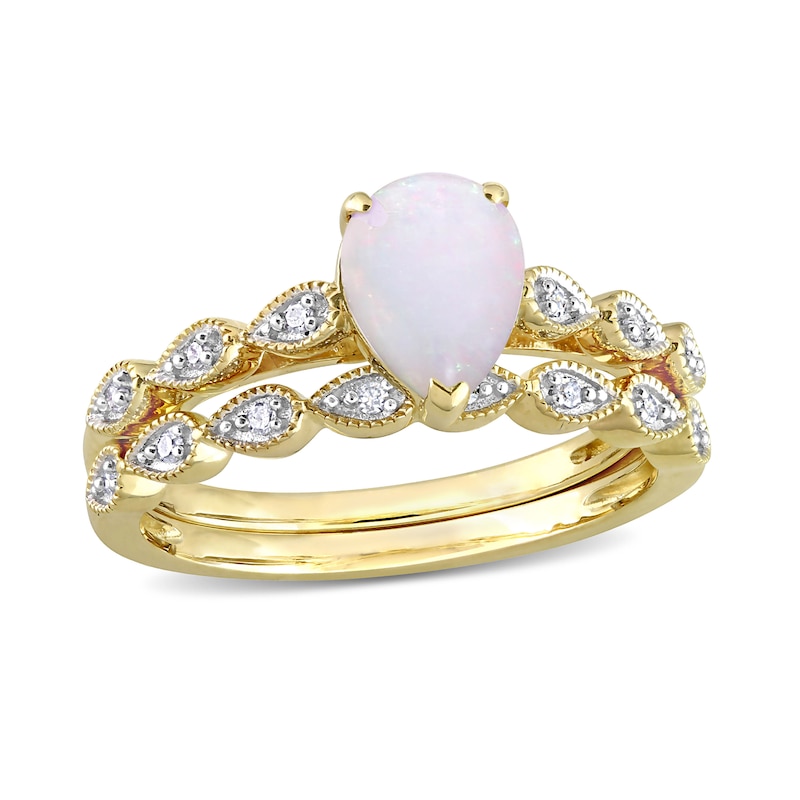 Pear-Shaped Opal and 0.07 CT. T.W. Diamond Sideways Pear-Shaped Shank Vintage-Style Bridal Set in 10K Gold